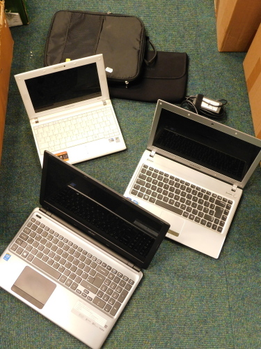 An Acer Aspire 15.5" laptop, E1-572, together with a Samsung 13" laptop, Q330, and a Samsung 10" notebook, N120, with charging cable.