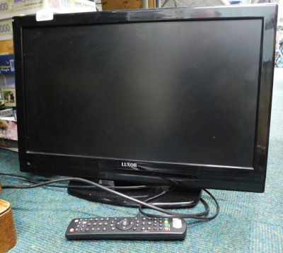 A Luxor 23" television, with lead and remote.