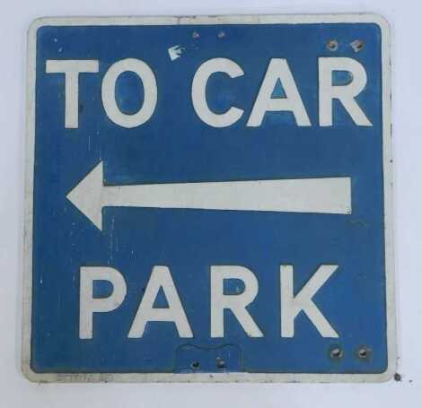 A painted cast metal two car park sign, 53.5cm x 53.5cm.