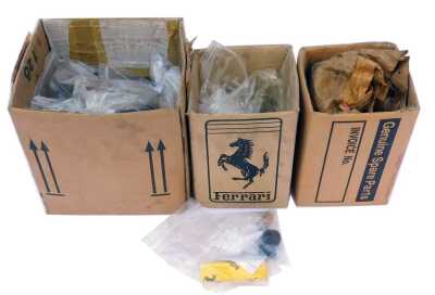 Car parts possibly Ferrari, including inner roll bar bushes, anti-roll bar bushes, needle bearings, brake lines, etc. (3 boxes)