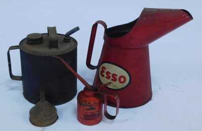 An Esso oil jug, in red, 32cm high, together with a Wesco oil can, funnel, and a galvanised metal oil can. (4)