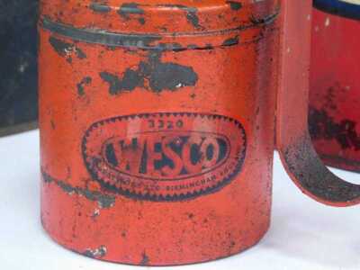 An Esso oil jug, in red, 32cm high, together with a Wesco oil can, funnel, and a galvanised metal oil can. (4) - 3