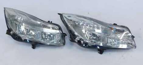 Two headlights for a Vauxhall Insignia.