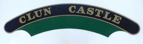 A reproduction locomotive nameplate, for Clun Castle, of arched form, 163cm long.