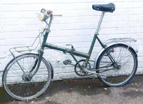 A Raleigh Stowaway three speed folding bicycle.