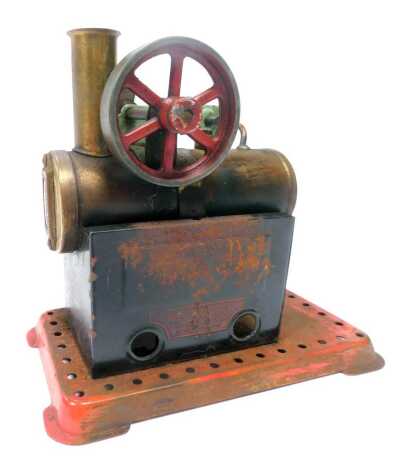 A Mamod small horizontal live steam engine.