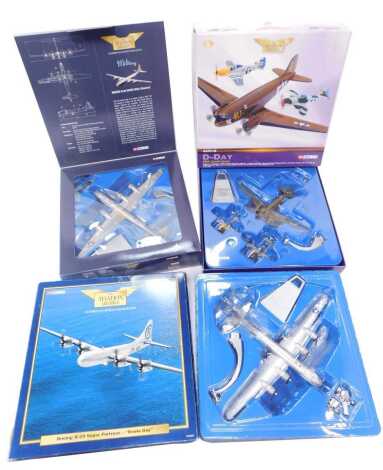 Corgi The Aviation Archive 1:44 scale boxed diecast planes, including AA31802, Beoing B29 Hawg Wild, AA31803 Boeing B29 Superfortress Enola Gay, and AA99148 D Day 60th Anniversary including Douglas C47 Sky Train, P47D Thunderbolt, and a P51D Mustang. (3)