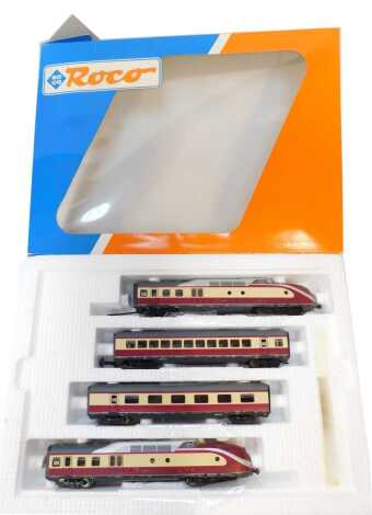 A Roco HO gauge Deutsche Bahn Intercity VT601 four car set, in maroon and cream livery, boxed.