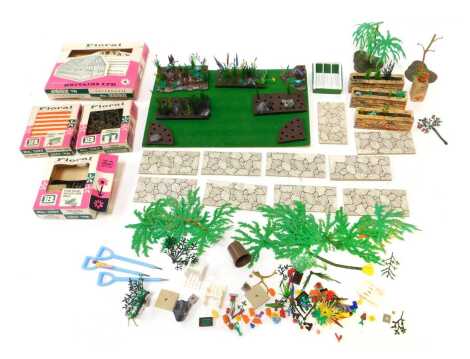 Britains Floral Miniature Garden accessories, including number 2592 Greenhouse, number 258 Pergola Standard Roses, number 259 Garden Swing Couch, number 258 Stone Pillars Wrought Iron Fences, etc. (1 box)