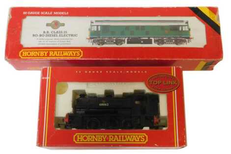 A Hornby OO gauge BR class 25 Bo-Bo diesel electric locomotive, in BR green, and a class J94 locomotive, in BR black, boxed. (2)