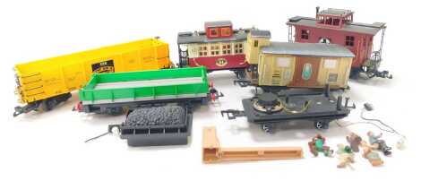 Bachmann and Playmobil G scale rolling stock, including caboose, plank wagons, figures, etc. (1 box)