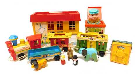 Fisher Price toys, including a Fisher Price Play Family children's hospital, a Fisher Price Toys Jack in the Box, Fisher Price circus train, Fisher Price music box pocket radio, etc. (1 tray)