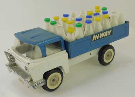 A Tri-ang Highway tinplate milk truck.