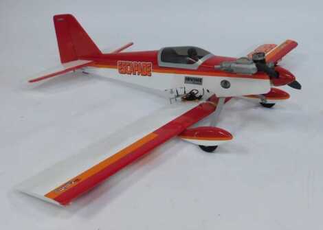 A Great Planes kit built RC plane Escapade, with Tower Pro and Futaba Servos, Irving motor, and Futaba receiver.