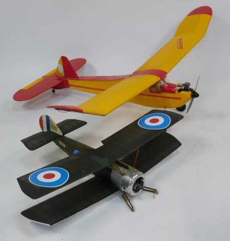 Two kit built remote controlled planes, including a Sopwith Camel, and another with Rix Max Servos and SC motor. (2)