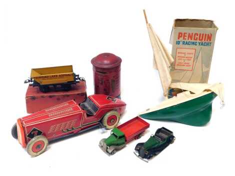 Toys, including Minic Toys wagon, Minic Toys clockwork 17M Vauxhall Tourer, Hornby Trains O gauge number 1 side tipping wagon, a Penguin 10" racing yacht, a clockwork tinplate Mettoy number 7 race car, and a Bernett Limited of London tinplate postbox. (1 