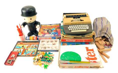 Toys and games, including child's wooden blocks, child's typewriter, Waddington's All Change, MB Games Twister, a HomePride Fred the Flour Man flour shaker, etc. (1 box)