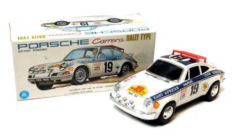 An Alps battery powered Porsche Carrera Rally Type Stop N Go flashing headlights, boxed.