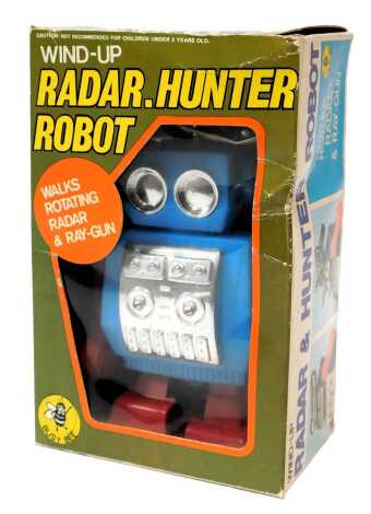 A Busy Bee wind up Radar Hunter robot, boxed.