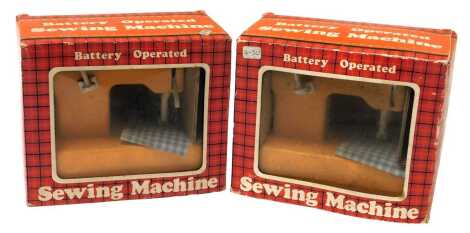 Two Alps battery operated sewing machines, boxed.