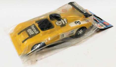 A Reel Alpine Renault V6 push car, in original retail packaging.