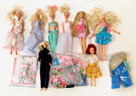 Mattel Barbie dolls, including clothing and other accessories. (1 box)