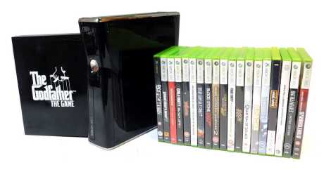 A Slim Xbox 360, cables and games including Grand Theft Auto 5, Wolfenstein the New Order, Call of Duty Black Ops 2, 007 Bloodstone, Golden Eye Reloaded, 007 Legends, etc. (1 box)