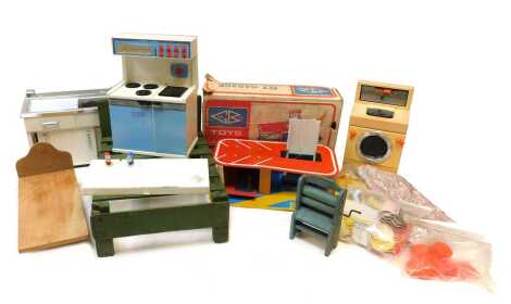 A GB Toys G1 garage, doll's bed, Kasaden Luxury toy spin dryer, a Cordon Bleu Katie toy cooker, etc. (a quantity)