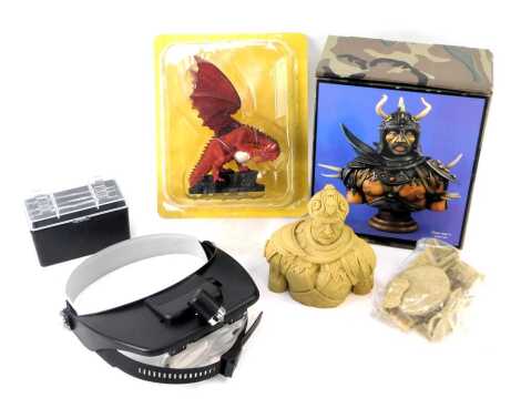 A Verlinden Productions Fantasy figure, Battle Lord, 1390, 18cm high, boxed, together with a Beasts and Beings collector's figure of a dragon, together with a headband magnifier, boxed.