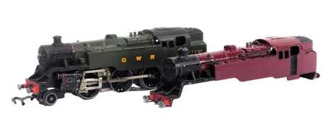 A Hornby Dublo three rail BR Standard class tank locomotive repainted in GWR green, and a crimson tank locomotive body.