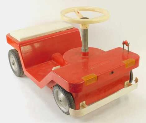 An Echo Car pedal car, in red, 64cm long.