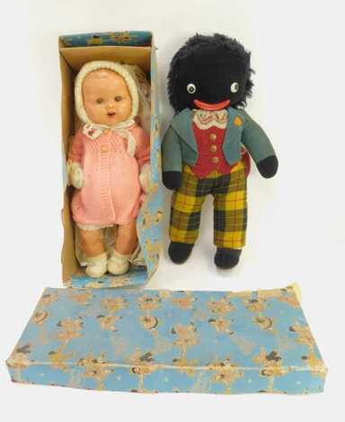 A Pedigree Dolls Delite doll, in knitted clothing, 50cm long, boxed, together with a soft toy.