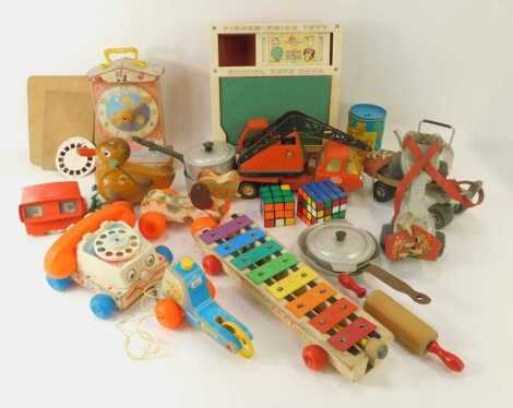 Various toys, to include a Tonka digger, xylophone, Rubix Cubes, Fisher Price family clock, pull along duck, miniature rolling pin, etc. (1 box)