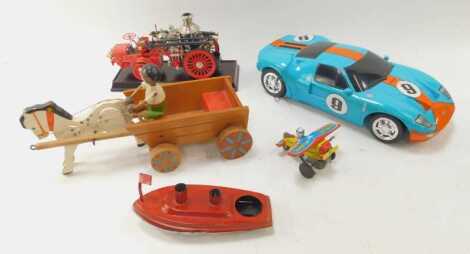 Various toys, to include a Yone Japanese mechanical tinplate circus plane, 10cm wide, boxed, a Zap Toys battery operated car, tinplate boat, model fire tender, etc.