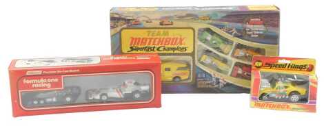 A Matchbox Super Fast Champions G4 set, together with a Matchbox Cam Buster K43 car, and a St Michael Formula 1 Racing two car set.