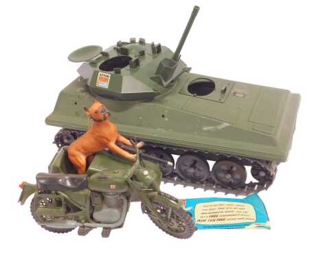 An Action Man tank, together with motorbike and sidecar, with dog.