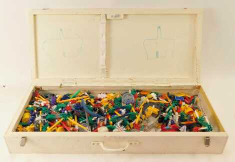 A painted wooden chest containing K'nex.