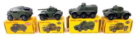 Four Dinky Toys vehicles, comprising armoured car 670 (2), armoured personnel carrier 676, and field artillery tractor 688.