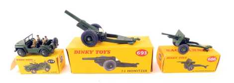 Three Dinky Toys vehicles, comprising 7.2 Howitzer 693, a 25 Pounder field gun 686, and an Austin Champ 674, boxed.