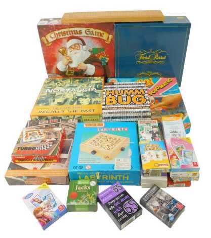 Various games, to include Traditional Santa Claus game, Trivial Pursuit, Hummbug playing cards, wooden labyrinth, Frustration, Pop O Matic, Cribbage board, New Motor Car game, Turbo Race Way, etc.