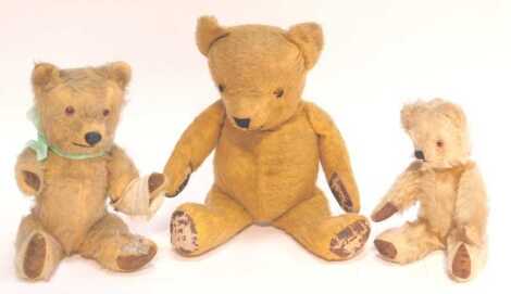 Early 20thC Teddy bears, including a mohair example with felt pads, 48cm high, etc. (3)