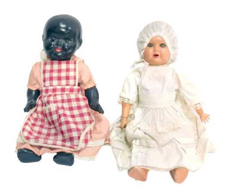 Two composite dolls, with sleep eyes. (2)