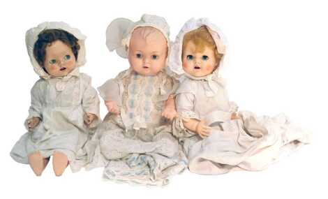 Three dolls, including a Pedigree walking doll, and two others. (3)