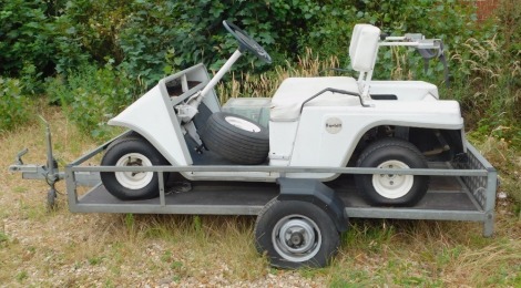 A Harbutt - Melex Type 212 3W golf cart, with charger, on a trailer, with 1984 parts catalogue.