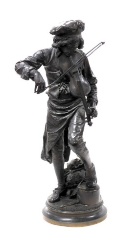 After Adrien Etienne Gaudez (French 1845-1902), 'Lulli Enfant', a bronze figure of a young violinist tuning his instrument, his foot raised on an upturned saucepan and with a cabbage at his feet, with circular socle base, inscribed, 73cm high.