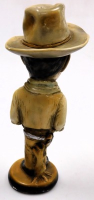 A plaster figure modelled as John Wayne, 44cm high. - 2