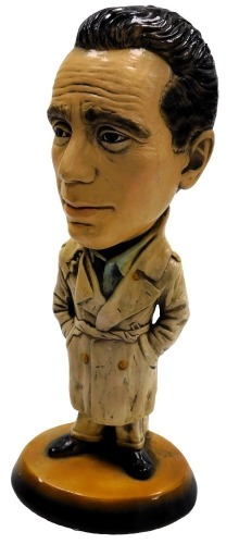 A plaster figure modelled as Humphrey Bogart, 40cm high.