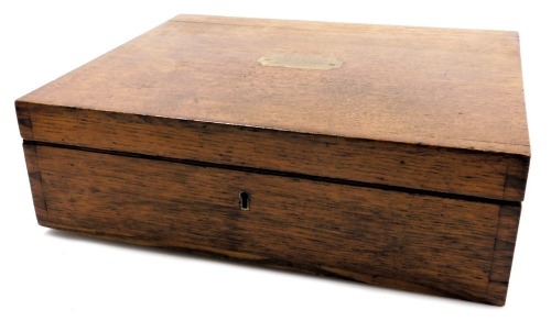 An Edwardian oak canteen box, for Elkington & Company Limited, the lid with brass plate, presentation engraved, and dated Septr 1903, 40.5cm wide, 32cm deep.