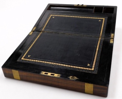 A Victorian walnut and brass bound writing slope, the hinged lid opening to reveal a fitted interior, 35cm wide, 22.5cm deep. - 2