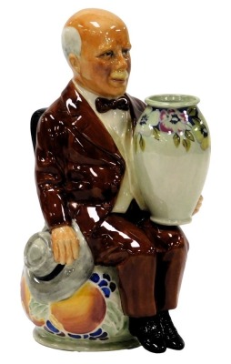 A Kevin Francis Ceramics pottery character jug of William Moorcroft, modelled seated, limited edition 336/350, by Douglas V Tootle, printed marks.